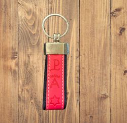 Llavero hierros ganaderias rosado y azul