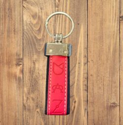 Llavero hierros ganaderias rosado y azul