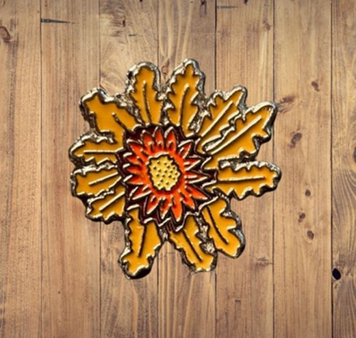 Pin Eguzkilore amarillo